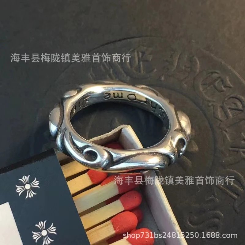 双边藤蔓花戒